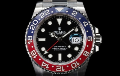 Steel Rolex GMT-Master II Pepsi with blue and red ceramic bezel and black dial on an Oyster bracelet
