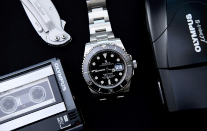 Steel Rolex Submariner Date with black dial and black ceramic bezel on an Oyster bracelet
