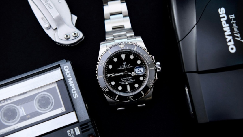 Steel Rolex Submariner Date with black dial and black ceramic bezel on an Oyster bracelet